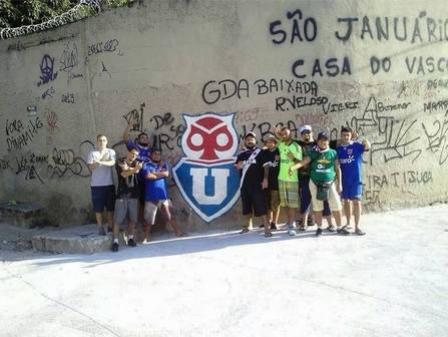 Smbolo da Universidad pintado em um muro no Rio