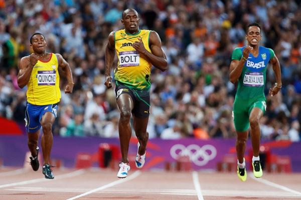 Aldemir (d) disputando prova com Usain Bolt (c) nas Olimpadas de Londres