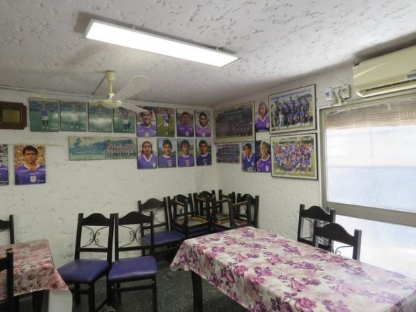 Sala de refeições do Defensor com quadros de fotos de seus principais jogadores: Martín é figura repetida