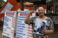 Tereza Borba com foto de Barbosa