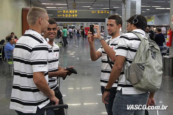 Jogadores no aeroporto